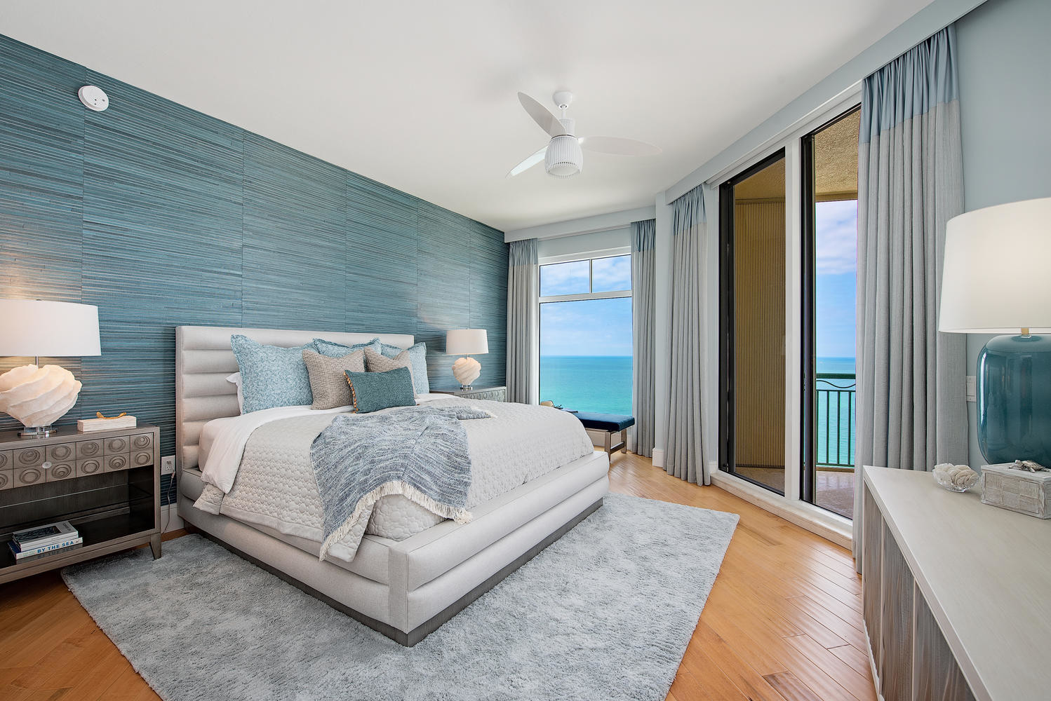 A Beach Style Guest Bedroom With The Cerulean Teal And Gray Wall 