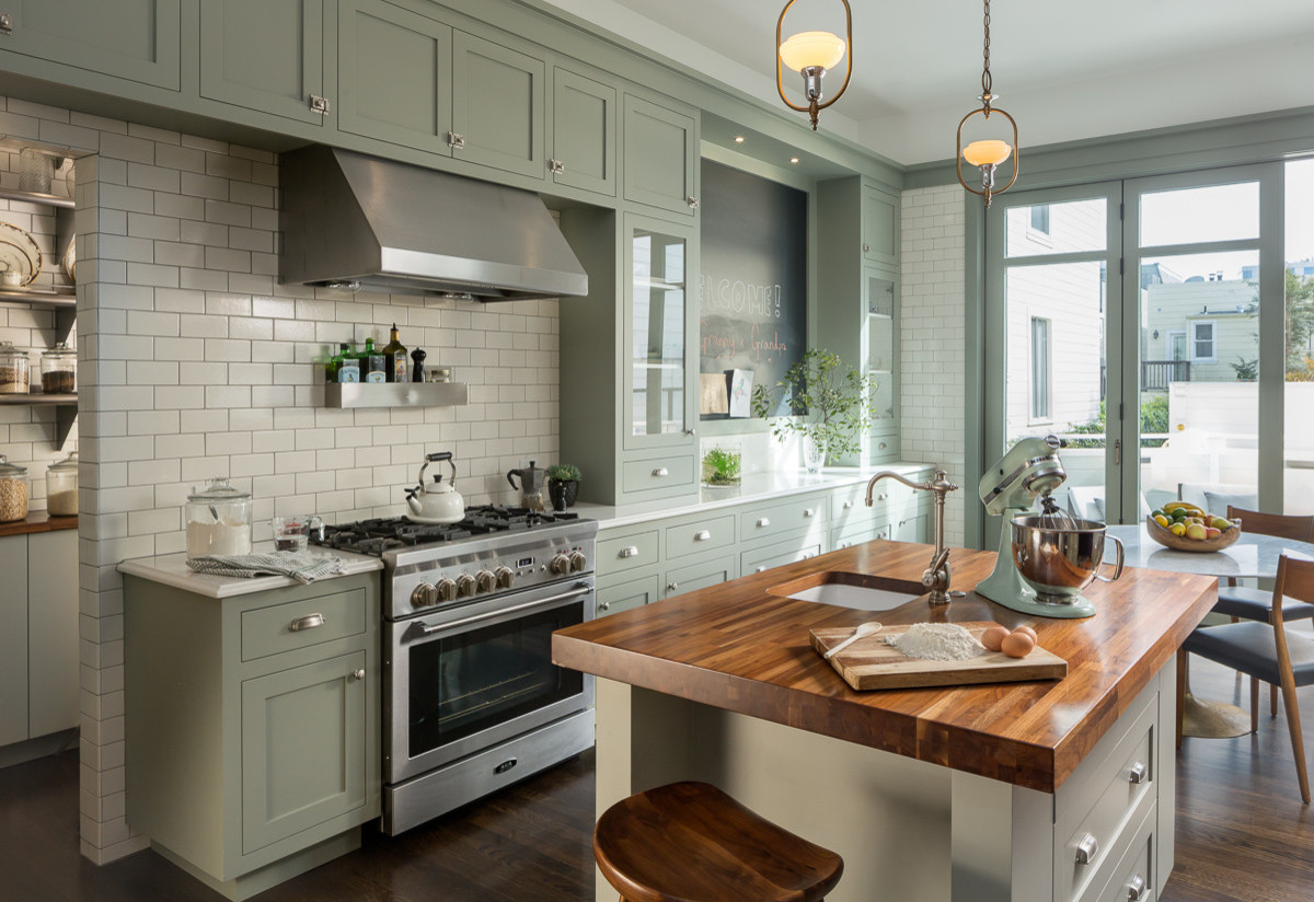 Sweet Victorian Kitchen With Sage Green Shaker Cabinets And Wood Countertops 